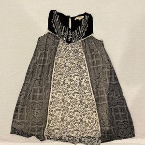 Rewind girls dress size Small. Black and white designed flow dress